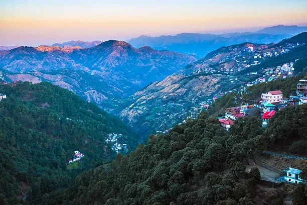 Shimla town spread across the hills at dawn