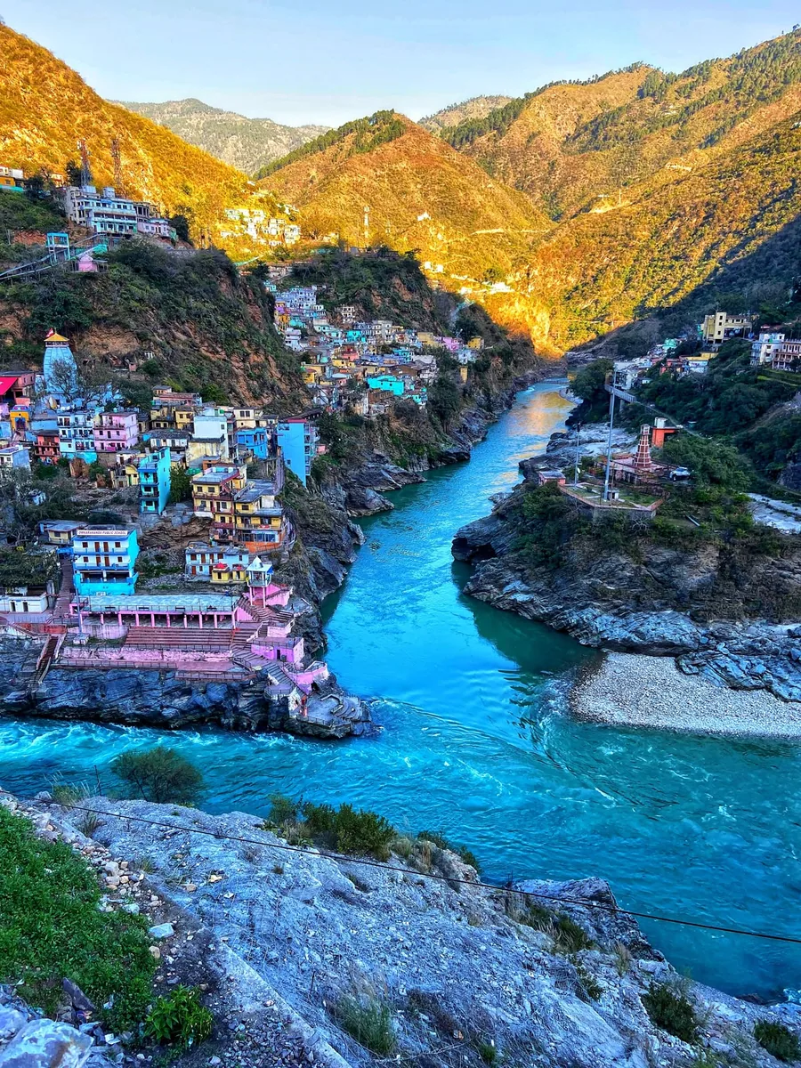 Turquoise river confluence and hillside town at Devprayag, Uttarakhand